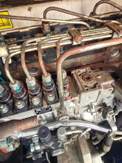 Injector pump and fuel lines on a diesel generator engine