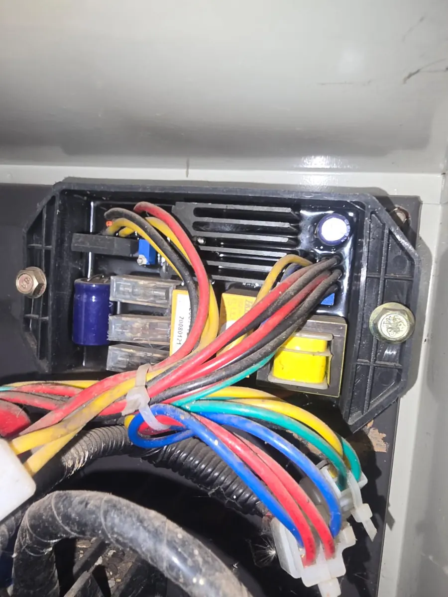 Automatic voltage regulator (AVR) wiring on a standby generator during fault finding