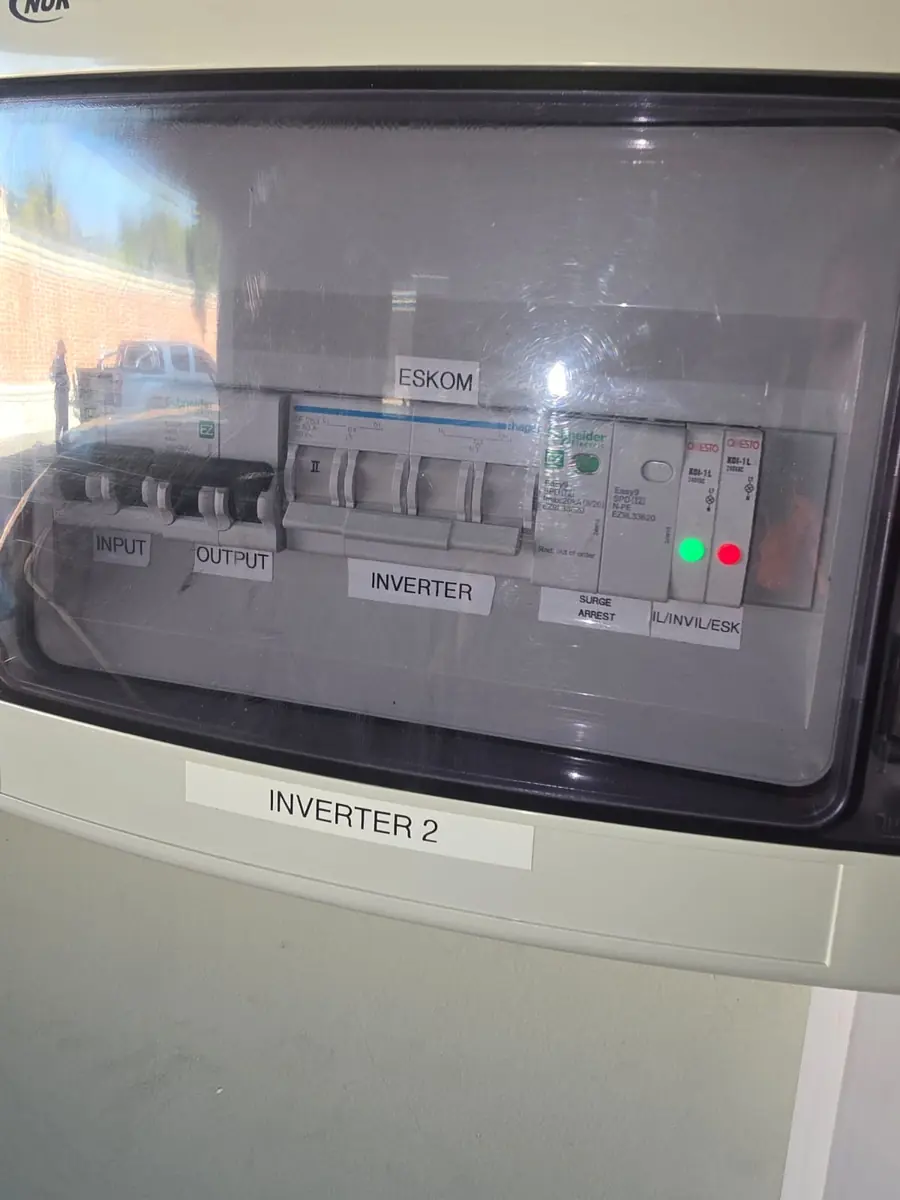 Labelled changeover box for a second inverter, with Eskom and inverter supply switches and surge protection