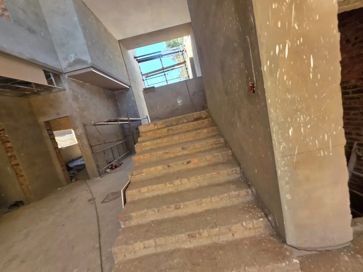 Staircase in a house under construction during the electrical first fix