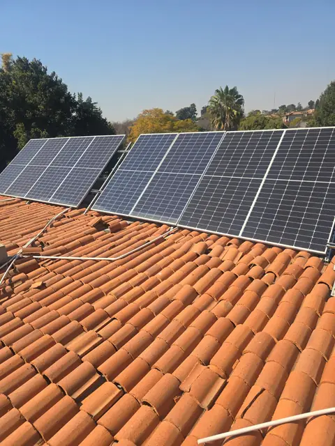 Solar panels mounted on the tiled roof of an East Rand home